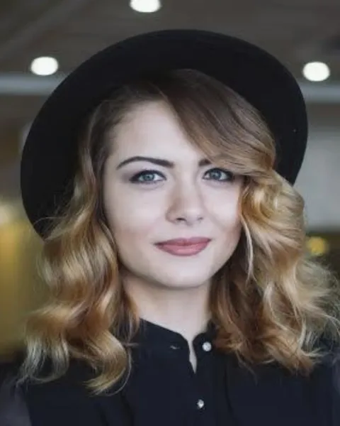 Grîu Zinaida, Model, Romania